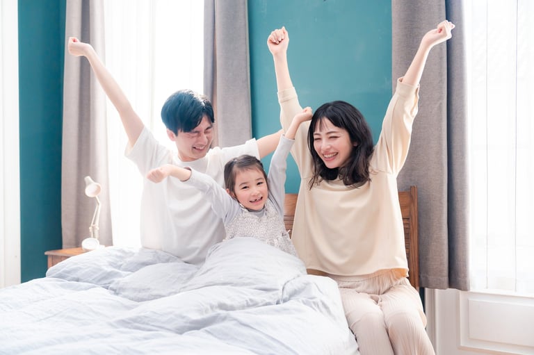Families waking up well in bed